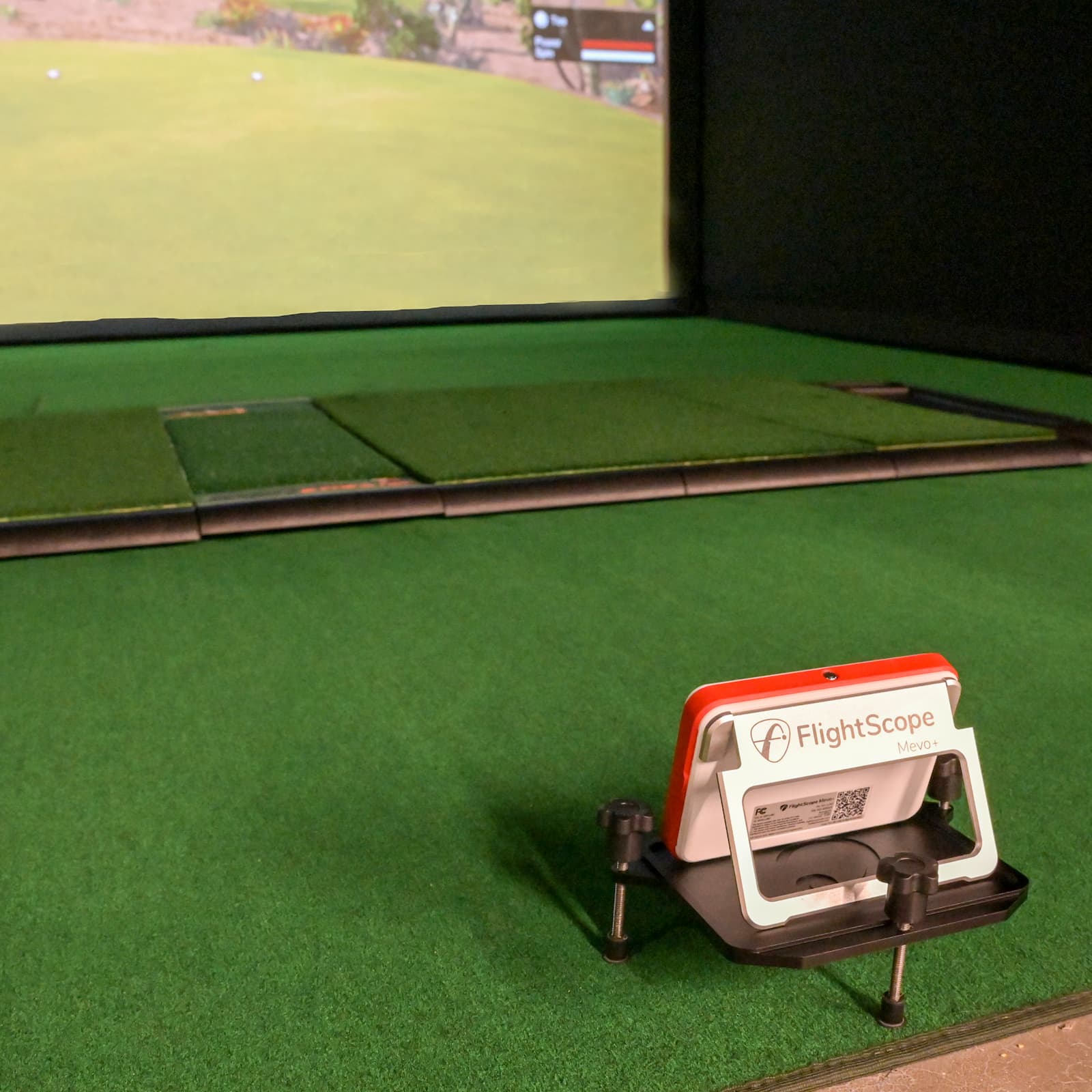 Flightscope Mevo+ Launch Monitor on top of Carl's Place Launch Monitor Alignment Stand