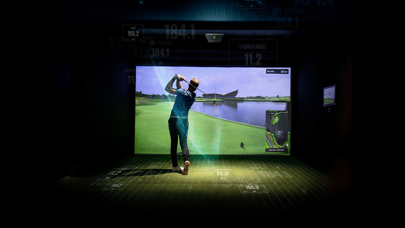 Trackman iO indoors with golfer in simulator